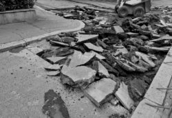 Cutting,The,Road,Surface,With,A,Demolition,Hammer.,The,Hammer