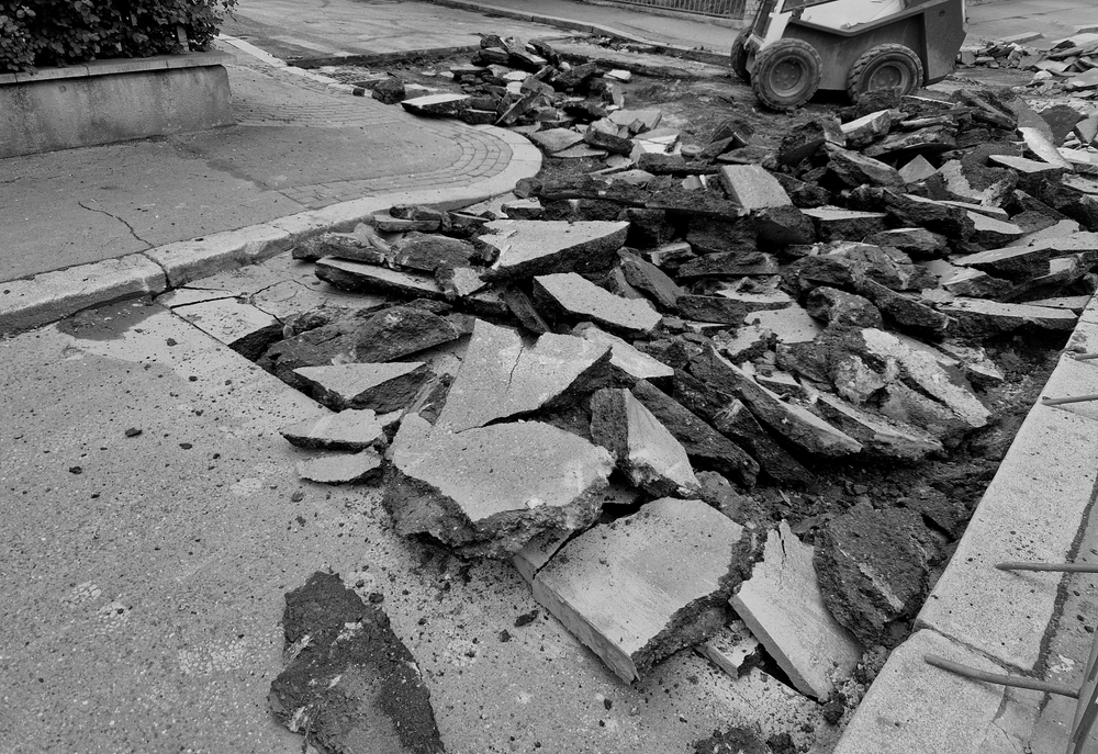 Cutting,The,Road,Surface,With,A,Demolition,Hammer.,The,Hammer