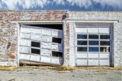 Aftermath,Of,Tornado,-,Commercial,Garage,Doors,In,Vintage,Brick