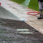 Professional,Hydroseeding,,Workman,Spraying,A,Mix,Of,Grass,Seed,And