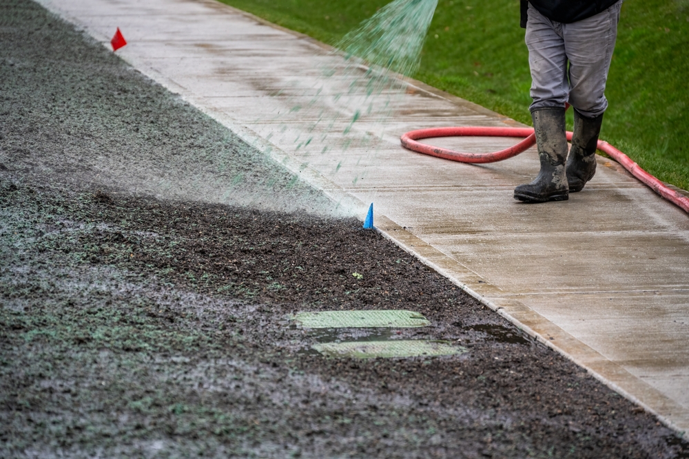 Professional,Hydroseeding,,Workman,Spraying,A,Mix,Of,Grass,Seed,And