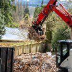 Demolition,Cleanup,And,Debris,Removal,,Heavy,Equipment,With,Jawbone,Bucket