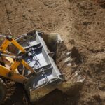 Bulldozer,Bucket,Leveling,The,Ground,,Bulldozer,Bucket,Ground,Leveling,,Close-up