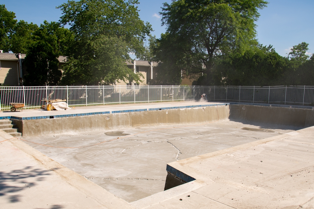 Jack,Hammer,Nearby,Swimming,Pool,Ladder,In,Front,Of,Tiles